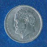 The Greek philosopher Democritus is depicted on Greek coins