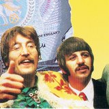 Members of The Beatles: George Harrison (vocals, guitar), John Lennon (vocals, guitar), Ringo Starr (drums), Paul McCartney (vocals, bass guitar)