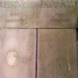 A metal strap marking the prime meridian (a longitude of 0 degrees) in Greenwich