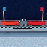 Пүршээр ижил масстай хоёр машиныг түлхэж холдуулах